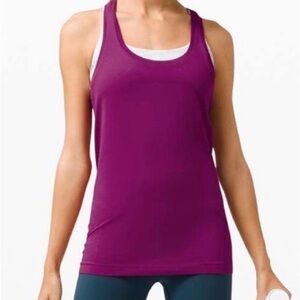 Lululemon Swiftly Tech Racerback 2.0
Deep Fuschia  Size 8 excellent condition